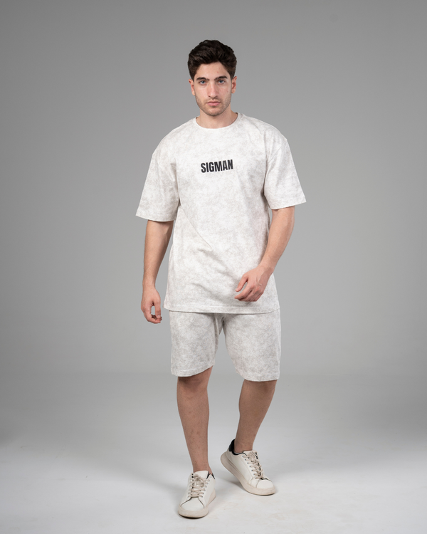 Man wearing a SIGMAN premium cotton two-piece summer short set in a warm-weather setting